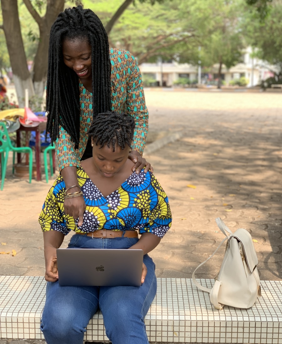 Parent and child learning together on a laptop