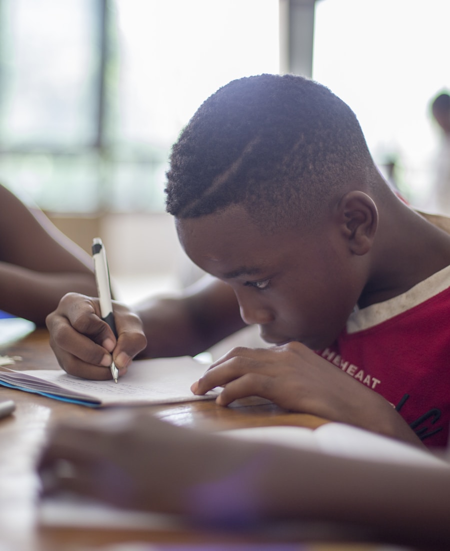 Student focused on writing — the daily practice that builds results