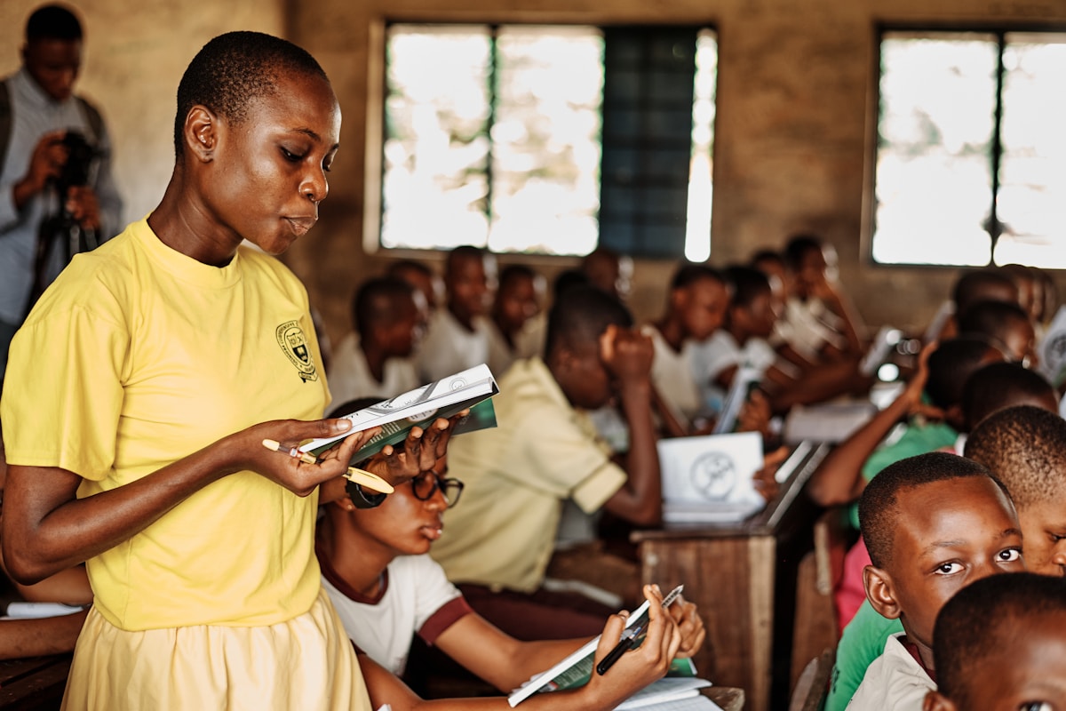 Teacher with students in Kenya
